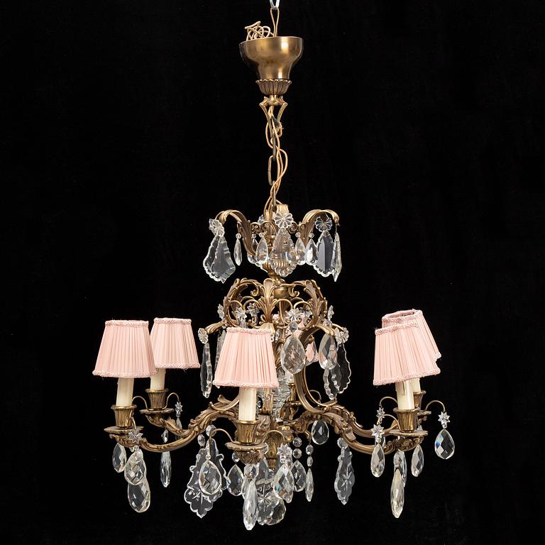 A brass and glass chandelier.