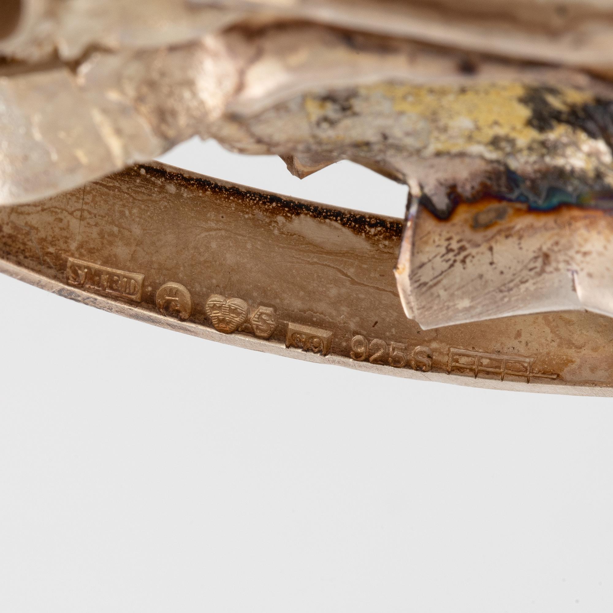 Lars Arby, three neck rings with pendants, silver, Gothenburg including 1977, 1978, and 1982.