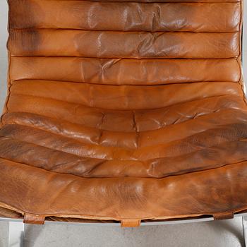 ARNE NORELL, fåtöljer, ett par med fotpallar, "Ari". Formgivna 1966.