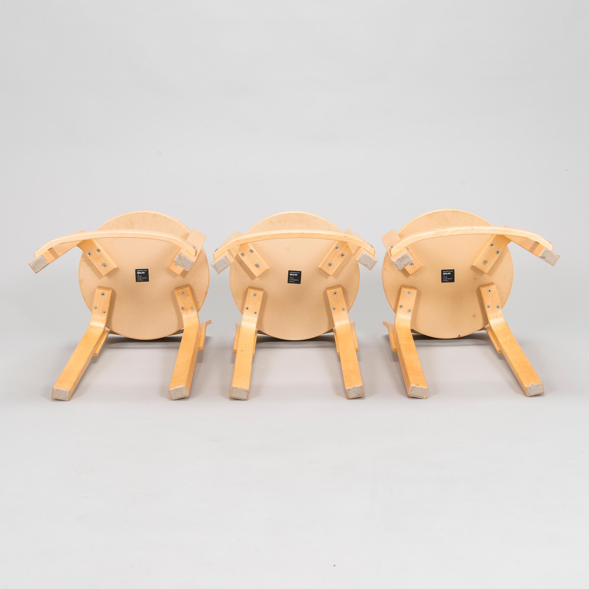 Alvar Aalto, a table and three chairs, Artek 2006 and 2007.