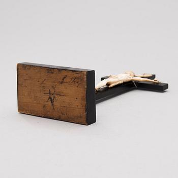 A WOODEN AND BONE TABLE CRUCIFIX with base. 19th Century.