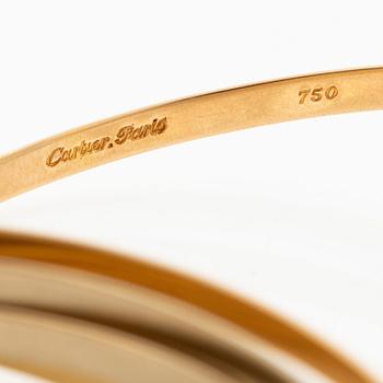 A Cartier bangle "Trinity" 18K gold in three colours.