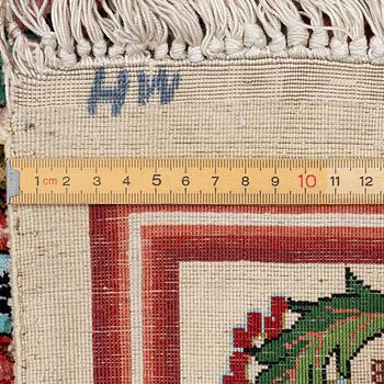 A silk Qum rug, central Persia, c. 213 x 135 cm.