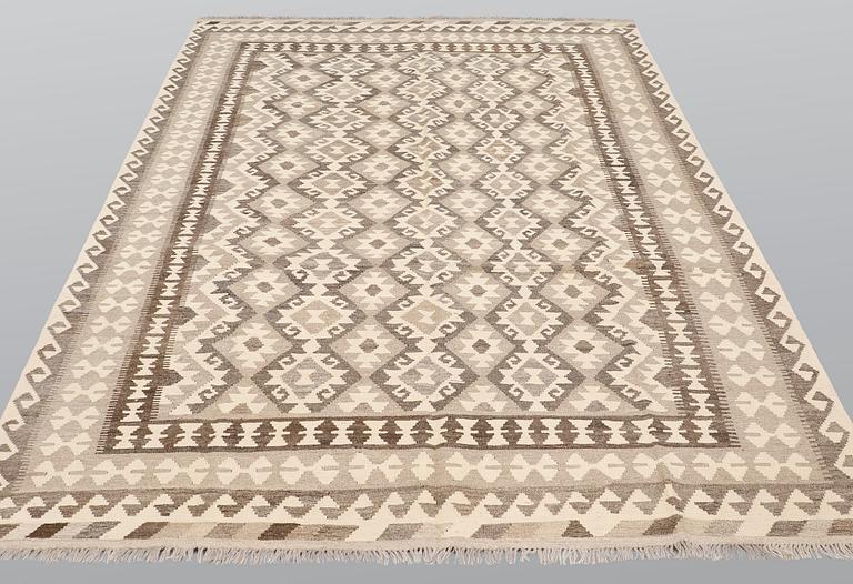 A carpet, Kilim, ca 305 x 198 cm.