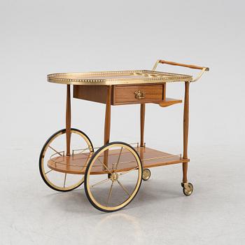 A mahogany-veneered serving trolley, mid 20th Century.