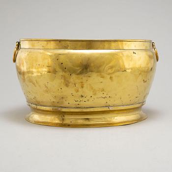 A possibly 17th century brass wine cooler.