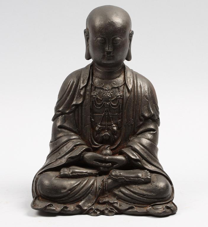 BUDDHAFIGUR, järn, orientalisk. 1900-tal.