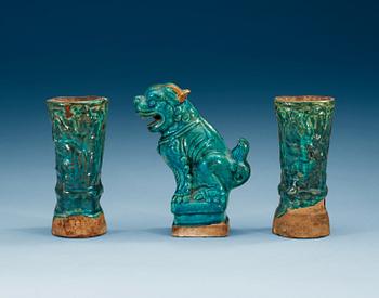 1463. A set of two turquoise glazed altar vases and a Buddhist lion, Ming dynasty (1368-1644).