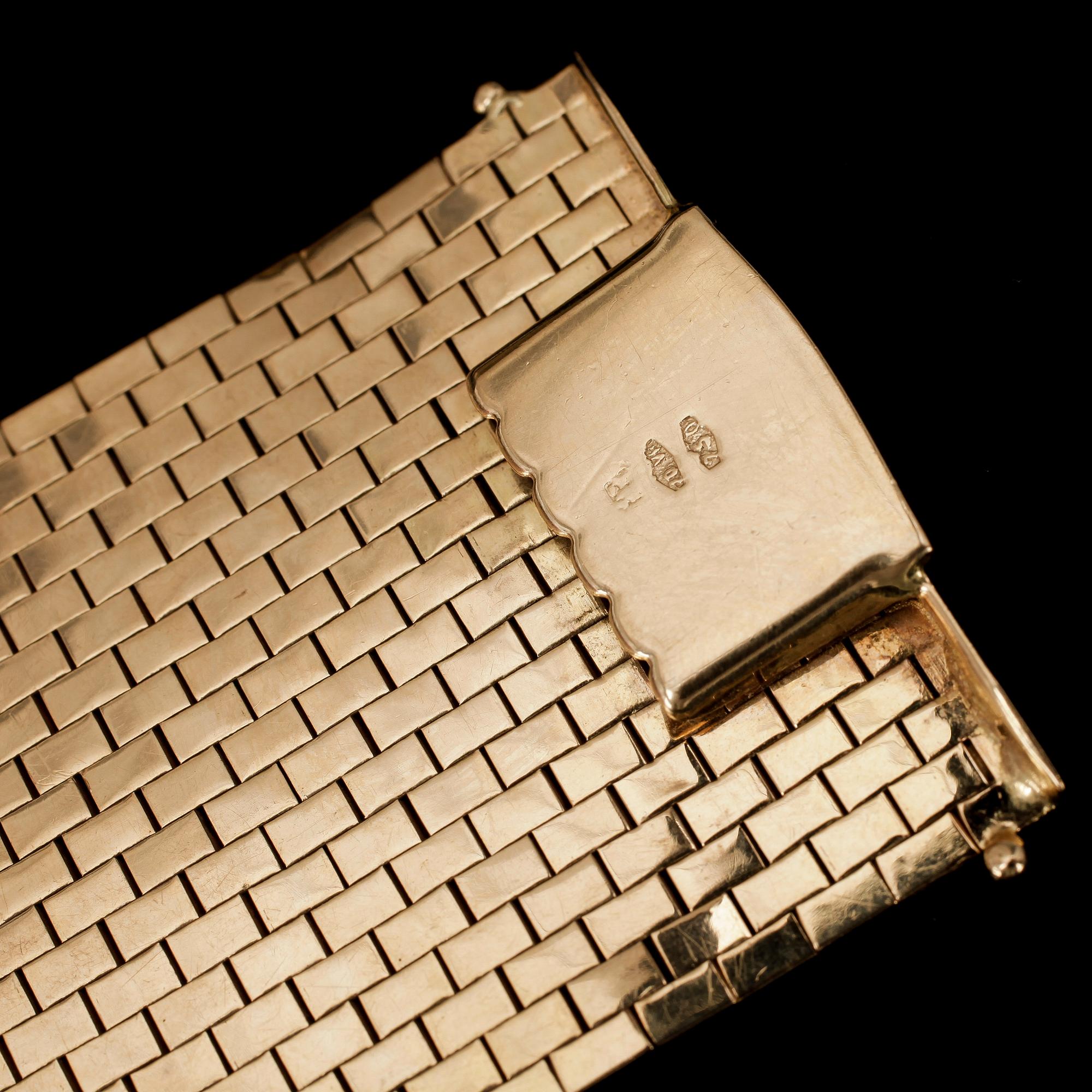 ARMBAND, 18k guld. Vikt ca90g.