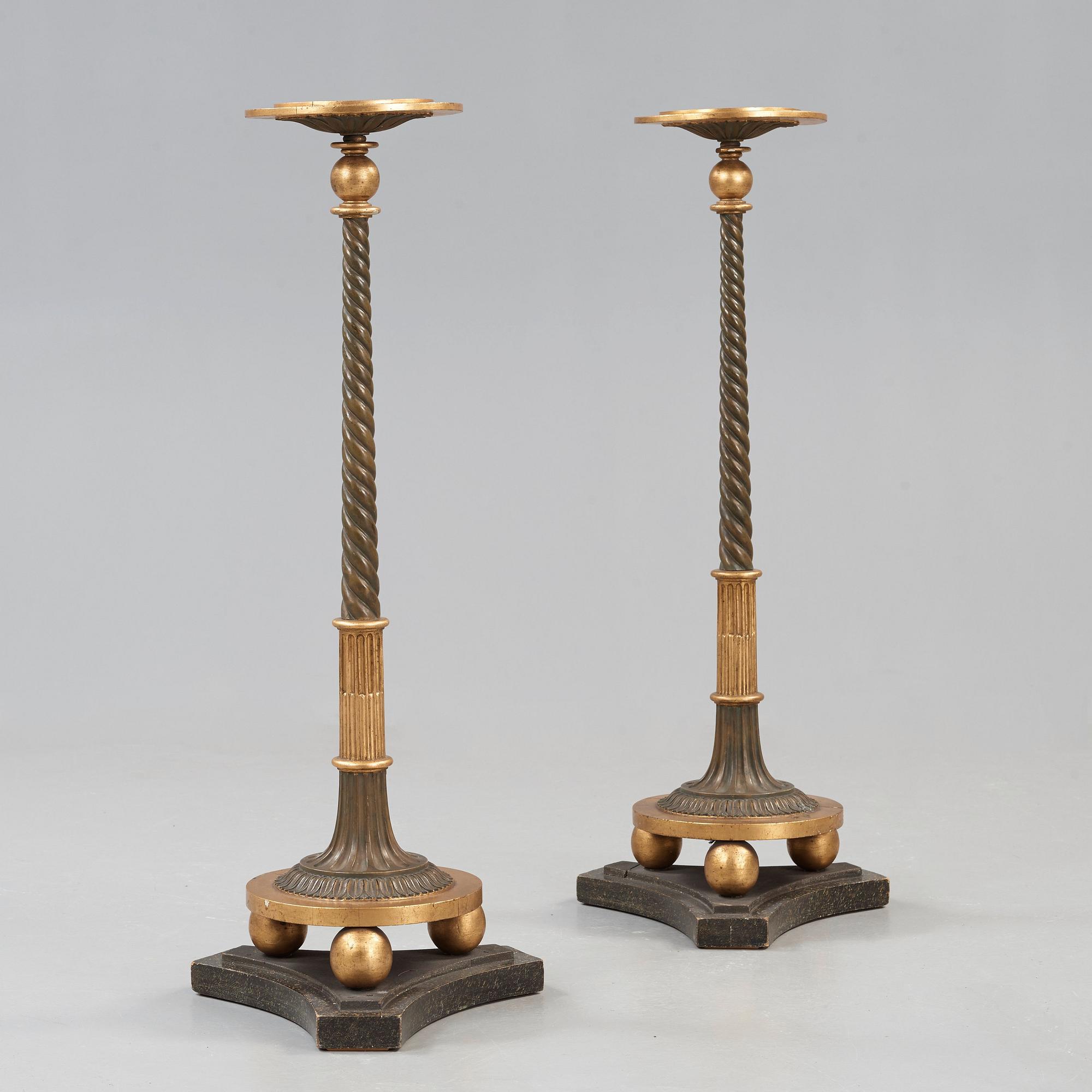 A pair of late Gustavian early 19th century candle stands.