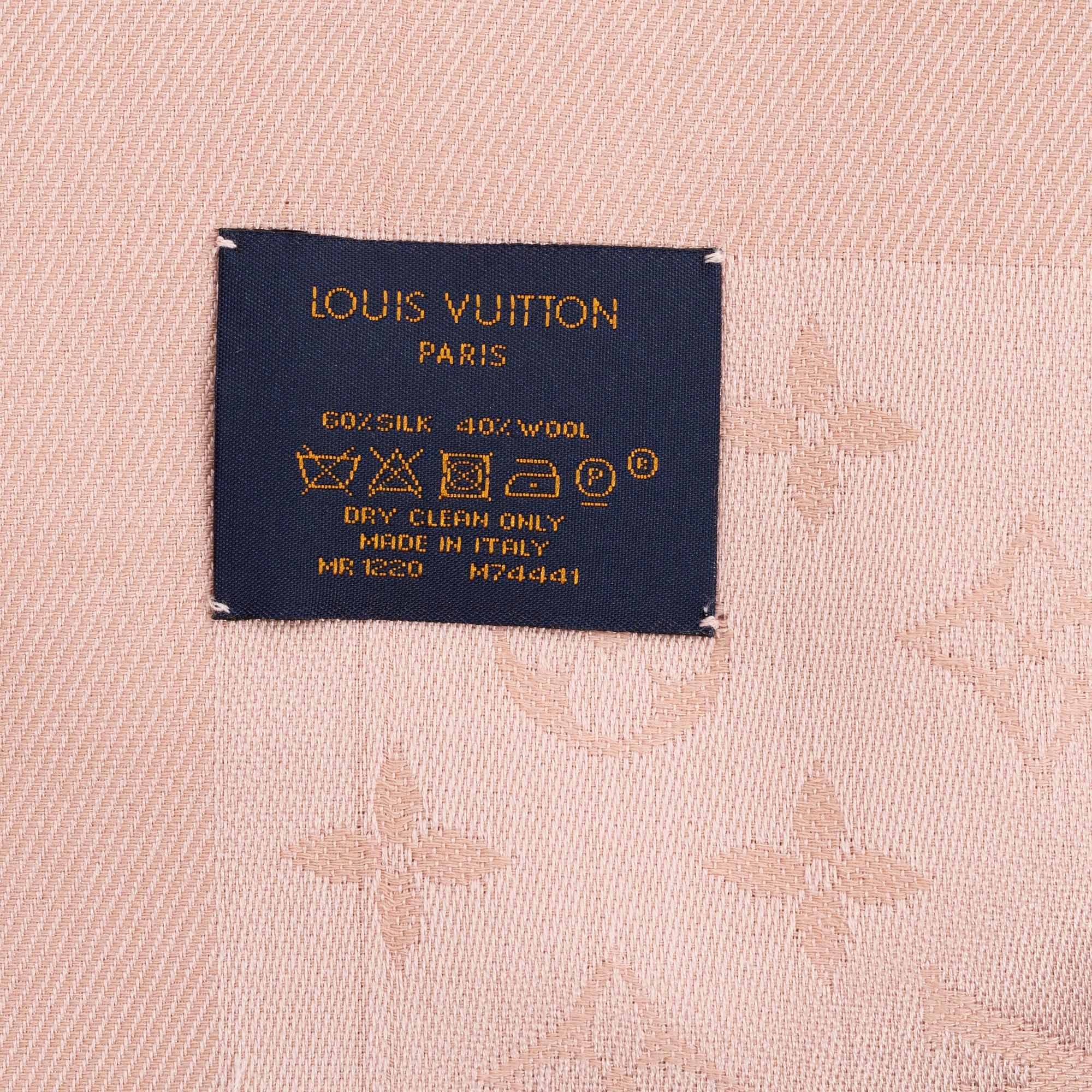 Louis Vuitton, a monogram silk and wool mix shawl.