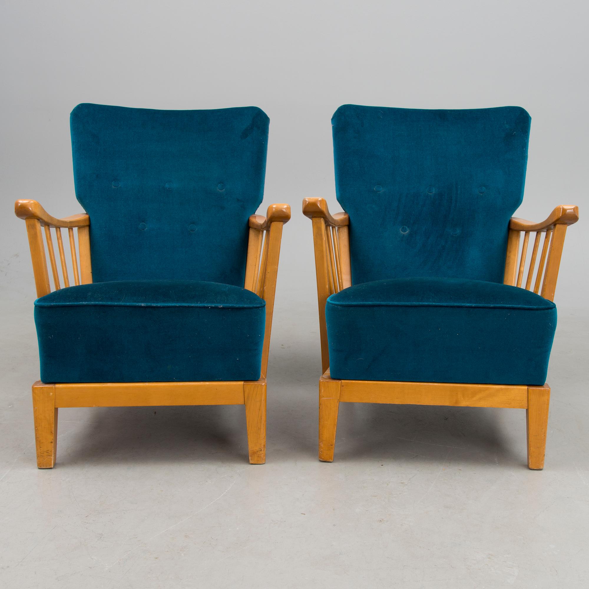 A pair of mid 20th century '2402 Armi' armchairs by Ilmari Lappalainen/Olavi Lieto, Asko, Finland.