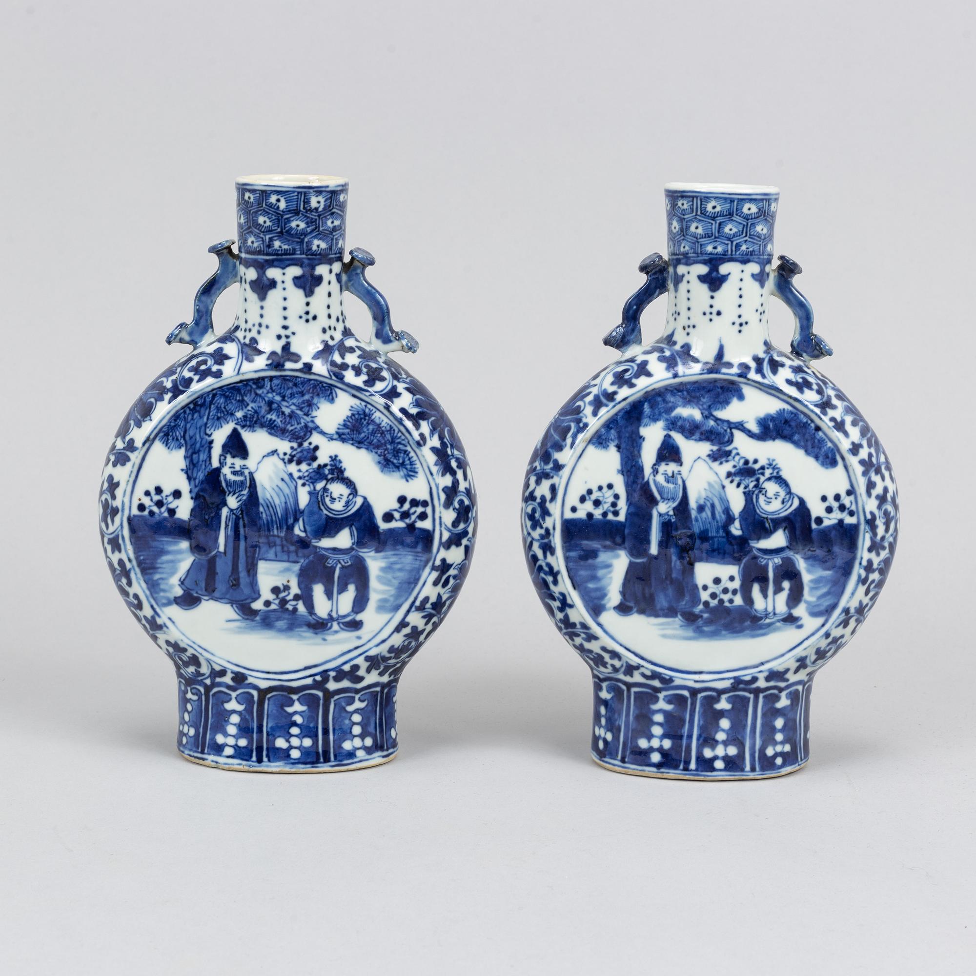 A pair of blue and white moon flasks, Qing dynasty, 19th Century.