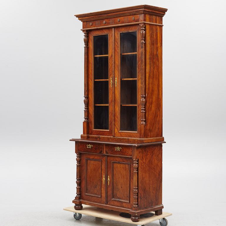 A display cabinet, late 19th century.