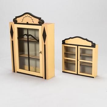 Two wall cabinets and shelves, Sagu pharmacy furniture, Finland early 20th century.