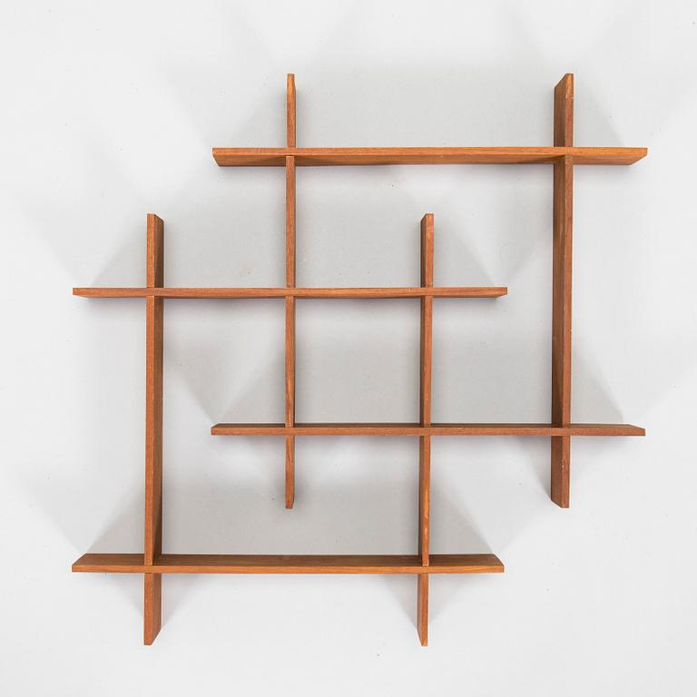 A mid-20th century teak wall shelf.