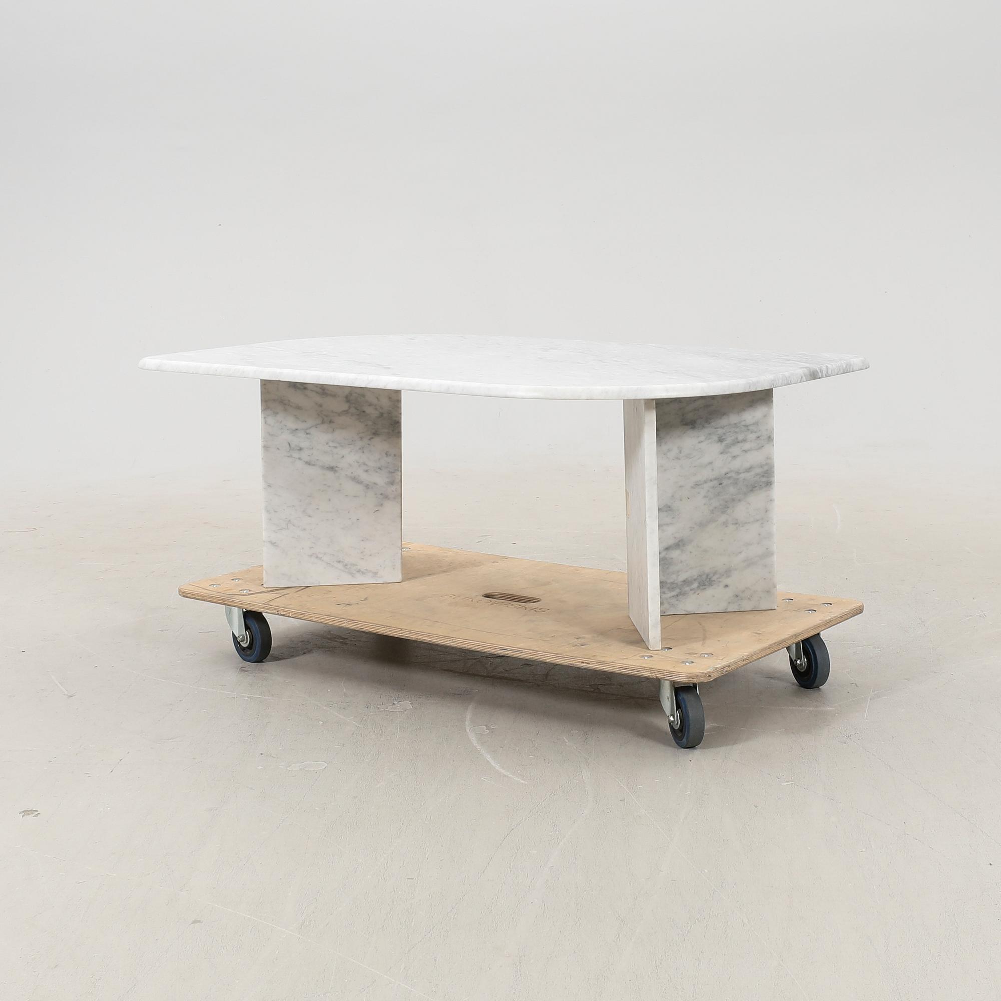 A 21st century marble coffee table.