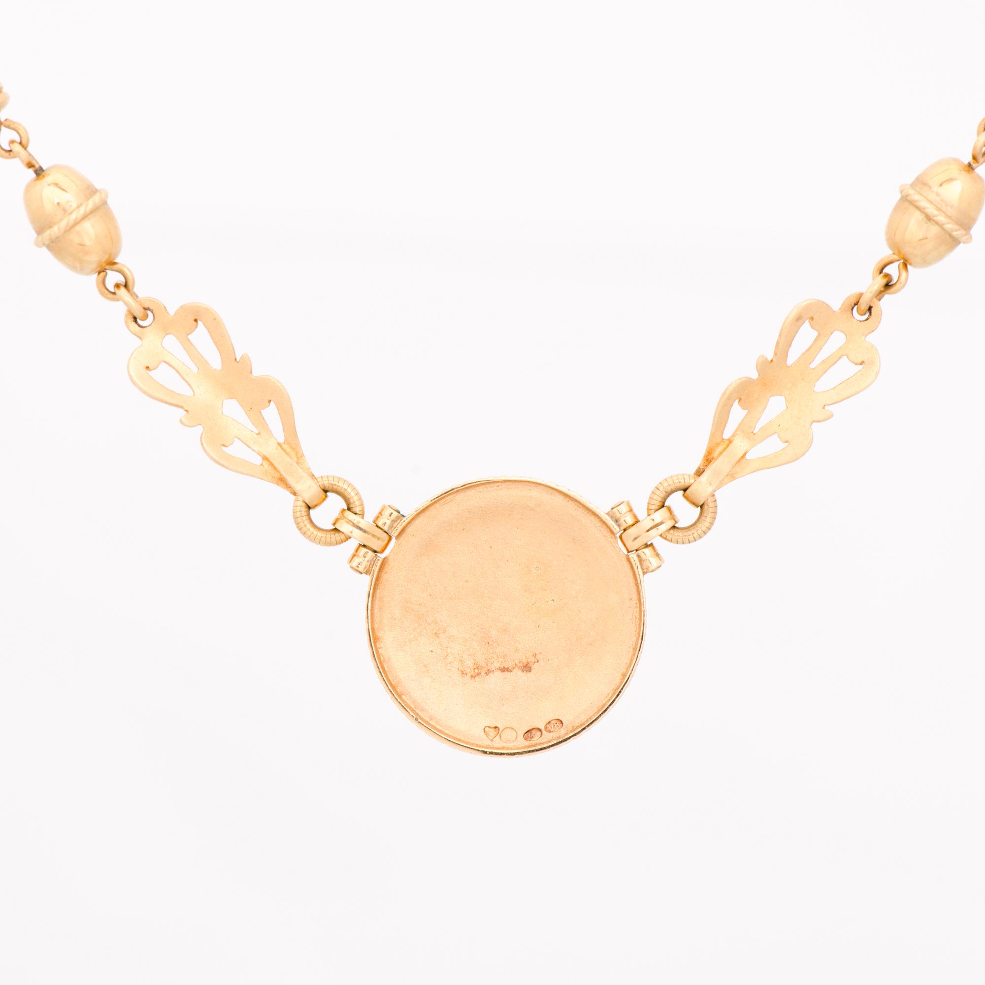 KAULAKORU, "Aurinkoleijona", 18K kultaa. Kalevala Koru 1998.