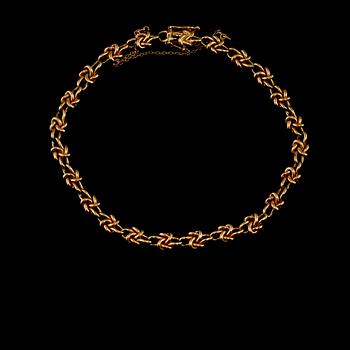 ARMLÄNK, 18k guld, importstämplad. Vikt 13 g.