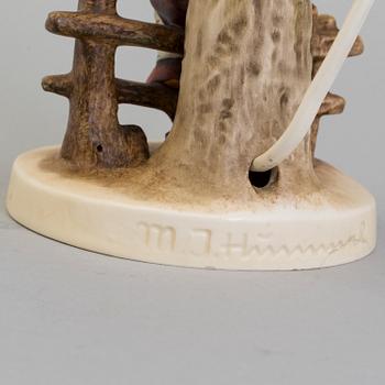 A Hummel porcelain lamp from Goebel, West Germany.