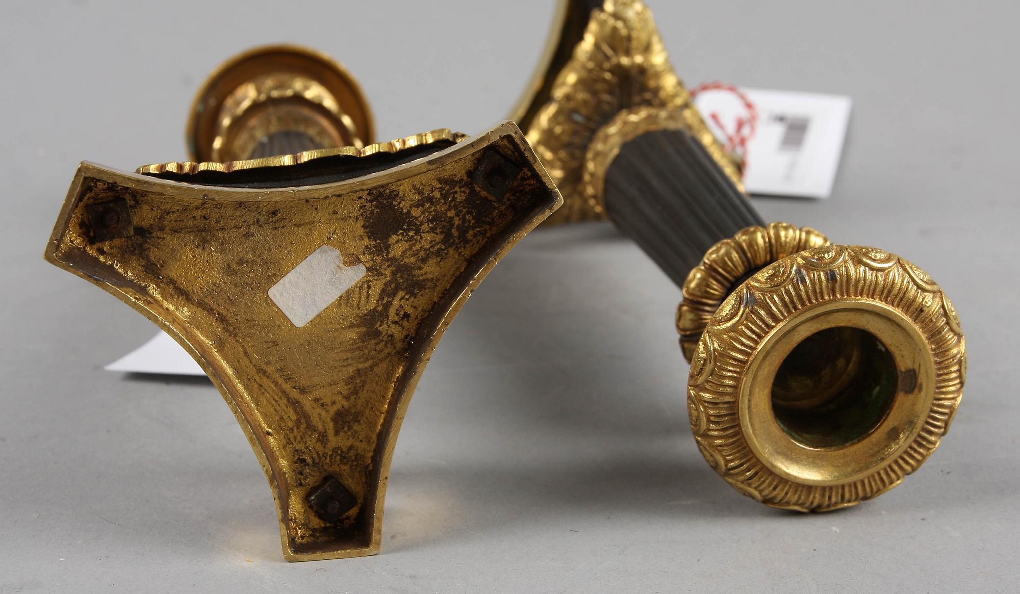 LJUSSTAKAR, ett par, empirestil. 1900-tal.