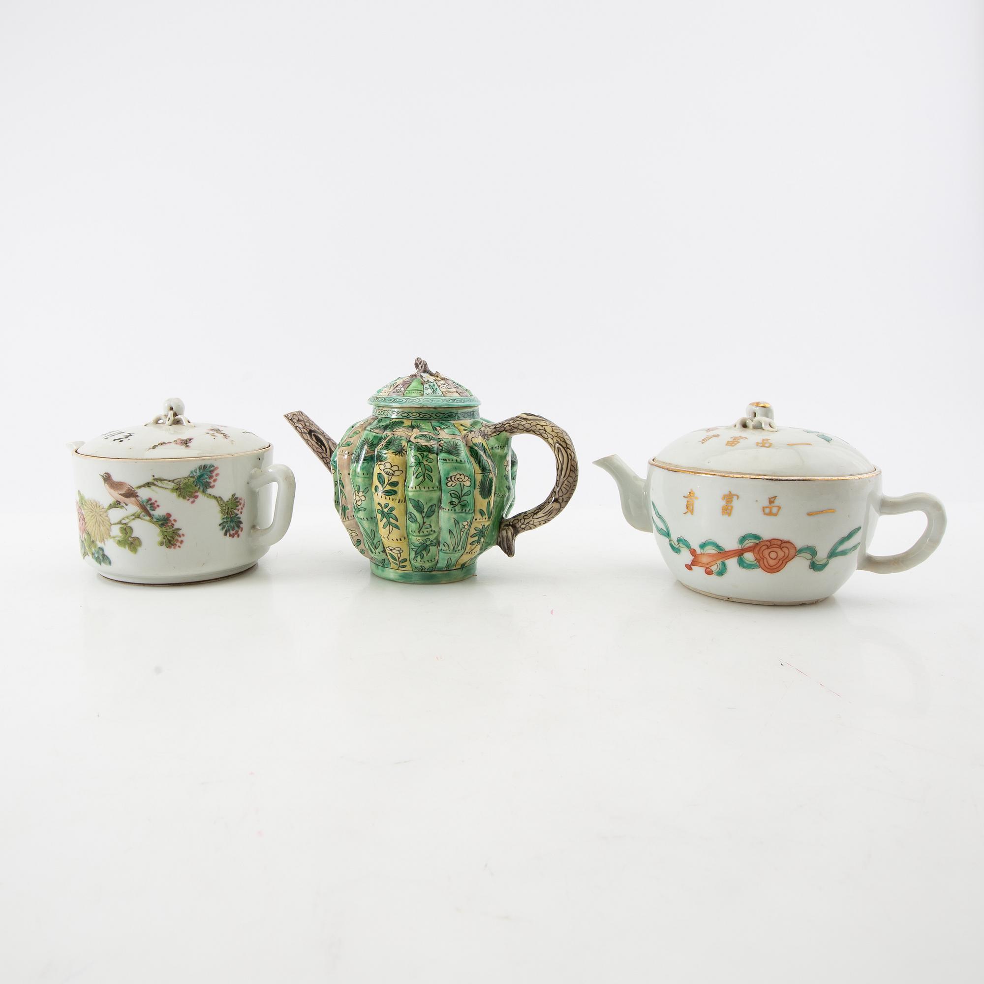 A set of three differently decorated tea pots with covers, Qing dynasty, 18century and 20th century.