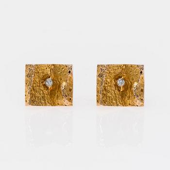 MANSCHETTKNAPPAR,"Gullies" Björn Weckström, Lapponia 1965. 14K guld, briljantslipade diamanter. Vikt ca 13,1 g.