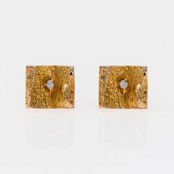 MANSCHETTKNAPPAR,"Gullies" Björn Weckström, Lapponia 1965. 14K guld, briljantslipade diamanter. Vikt ca 13,1 g.