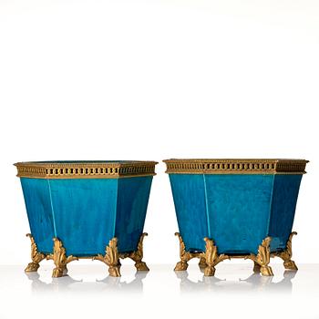 A pair of turkoise bronze mounted flower pots, late Qing dynasty.