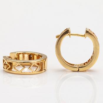 A pair of 18K gold earrings with yellow sapphires and ca 0.01 ct of diamonds.
