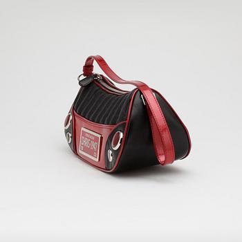 CHRISTIAN DIOR, a black leather shoulder bag with red patent details, "Montaigne Chris 1947".