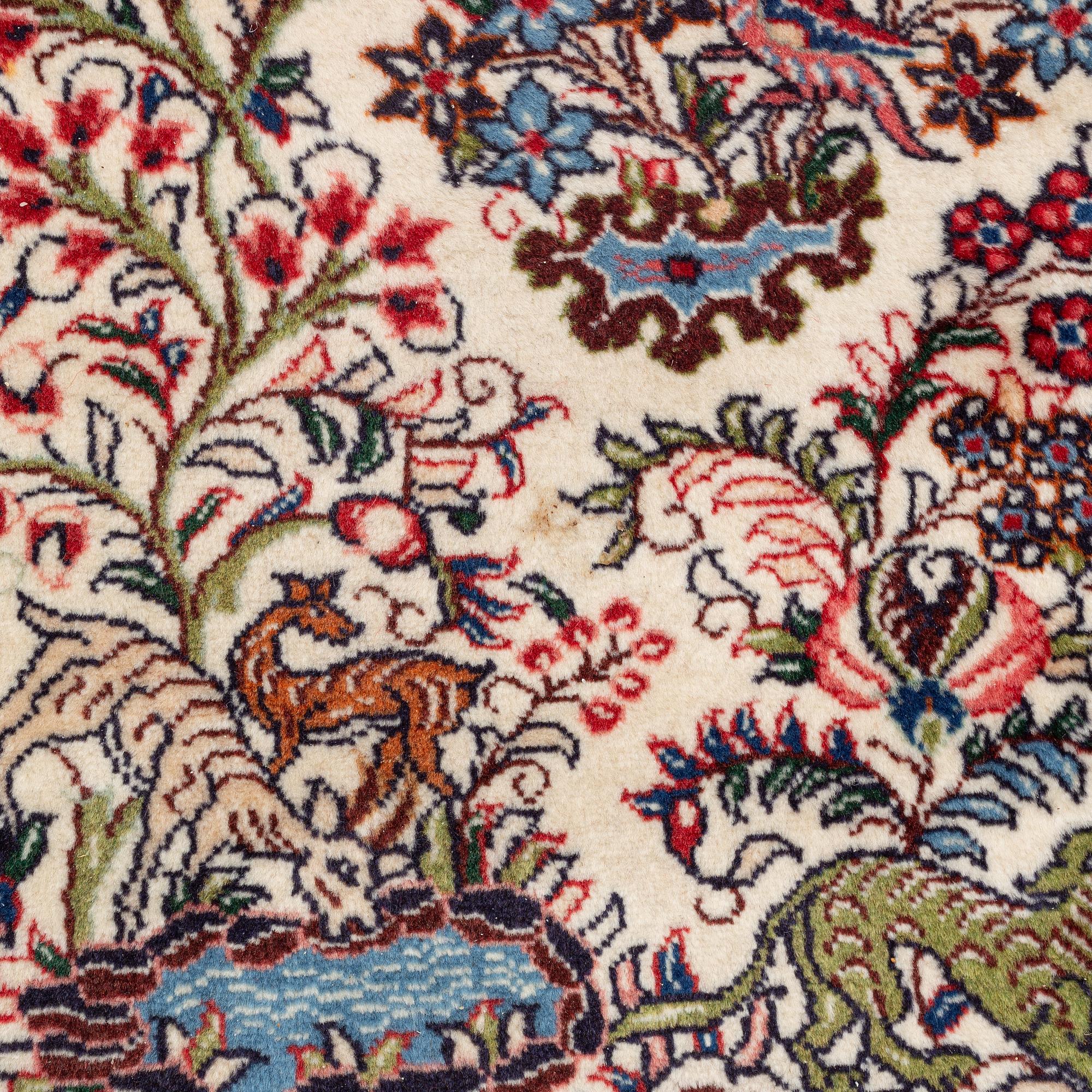 A rug, Kerman, figural, ca 222 x 218 cm.