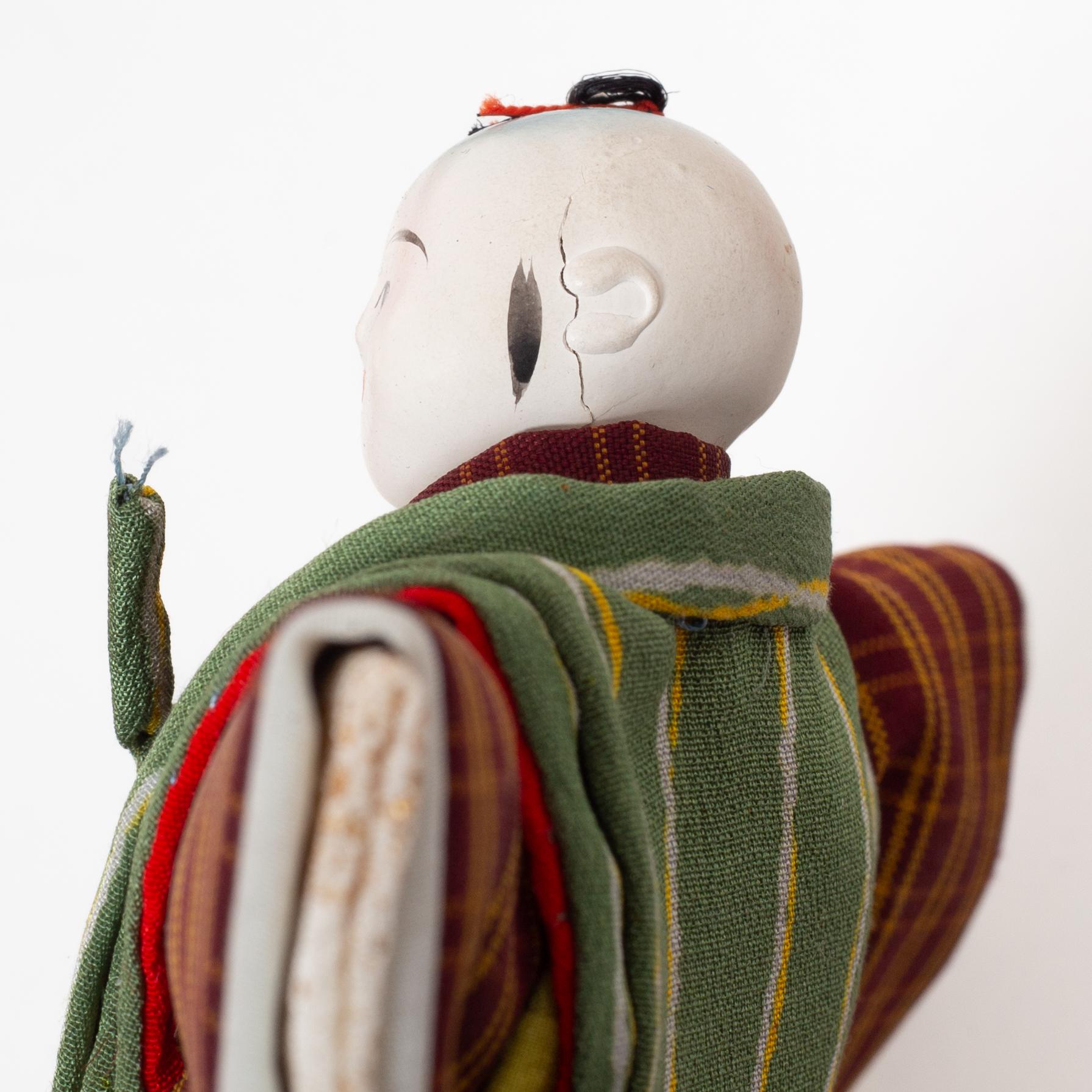 A group of eight Asian curio items, 19th and 20th century.