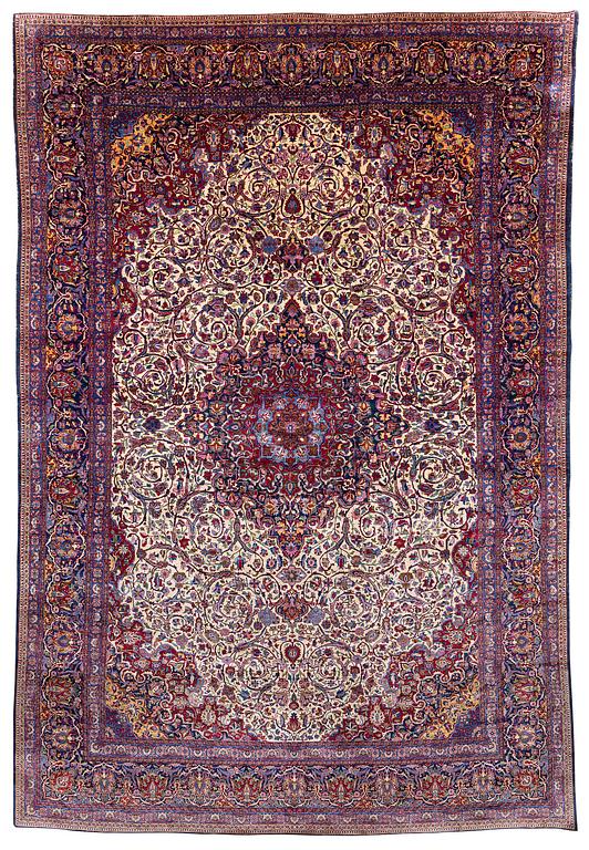 An antique silk Kashan carpet, central Persia (Iran) c. 378 x 259 cm.