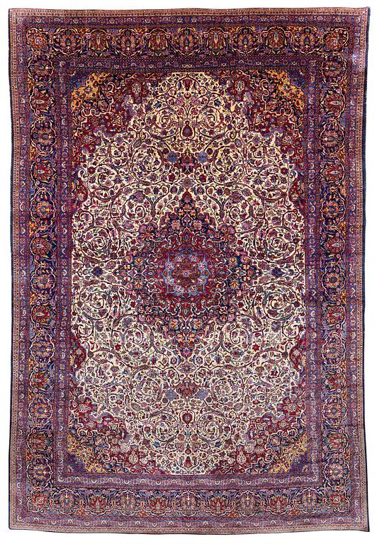 An antique silk Kashan carpet, c. 378 x 259 cm.