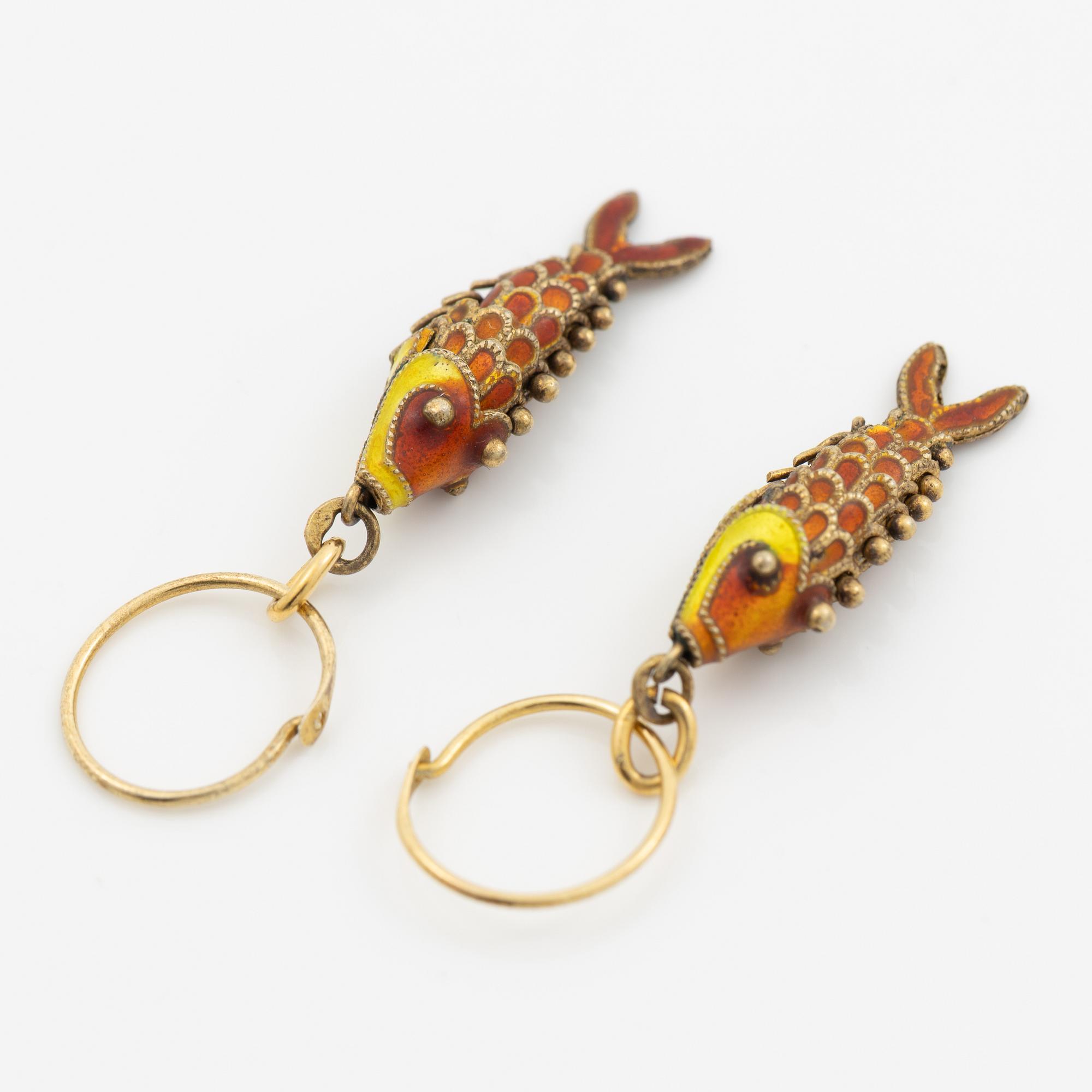 Silver earrings with enamel in the shape of fish.