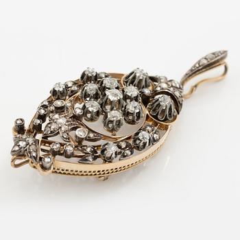 Brooch/pendant in 18K gold and silver set with old-cut and rose-cut diamonds, circa 1900.