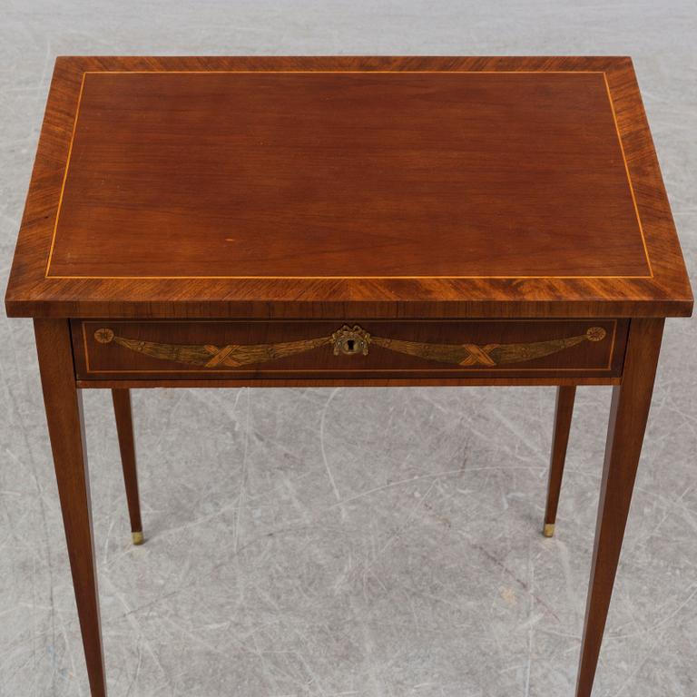 A gustavian style sewing table, early 20th century.