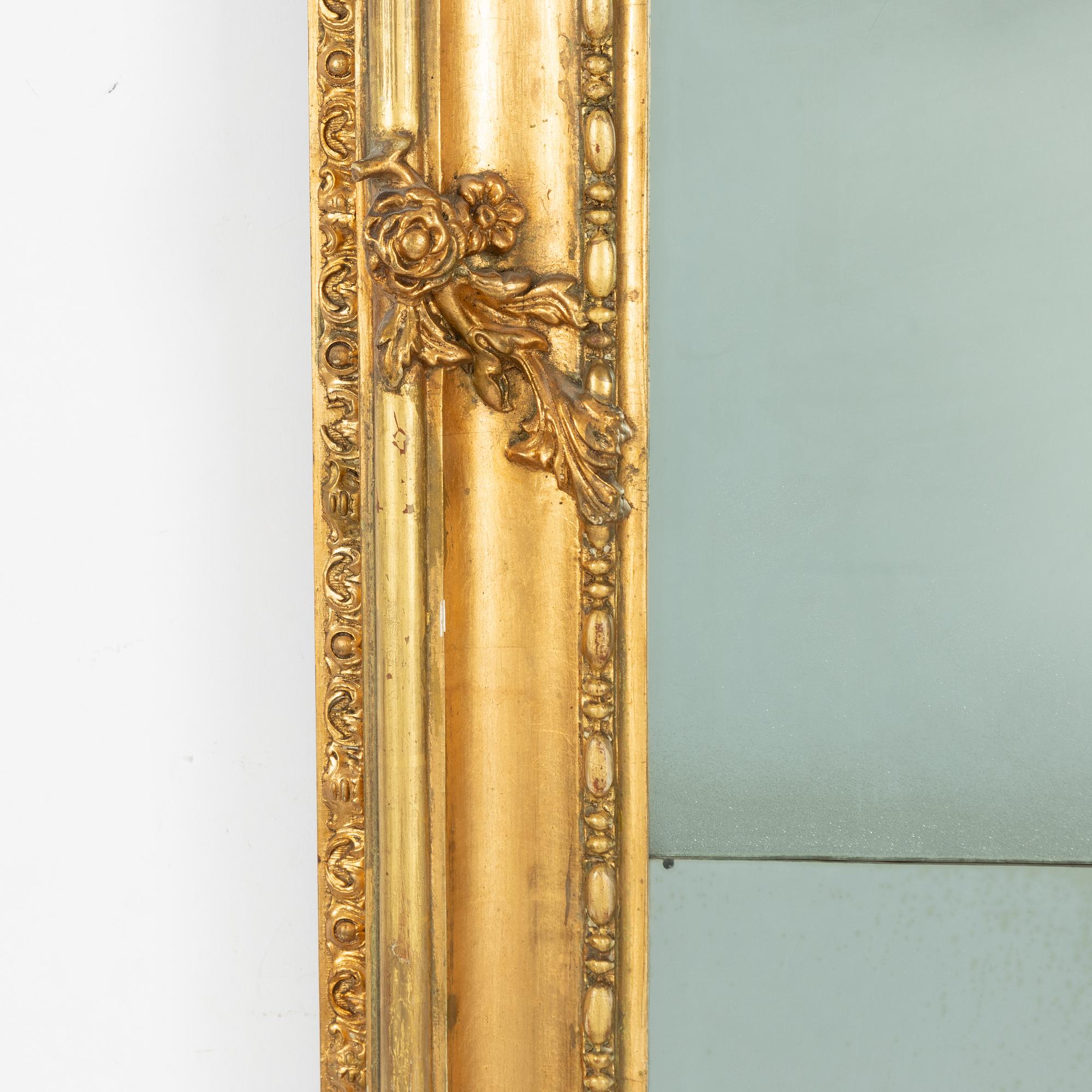 A Rococo style mirror, second half of the 19th Century.