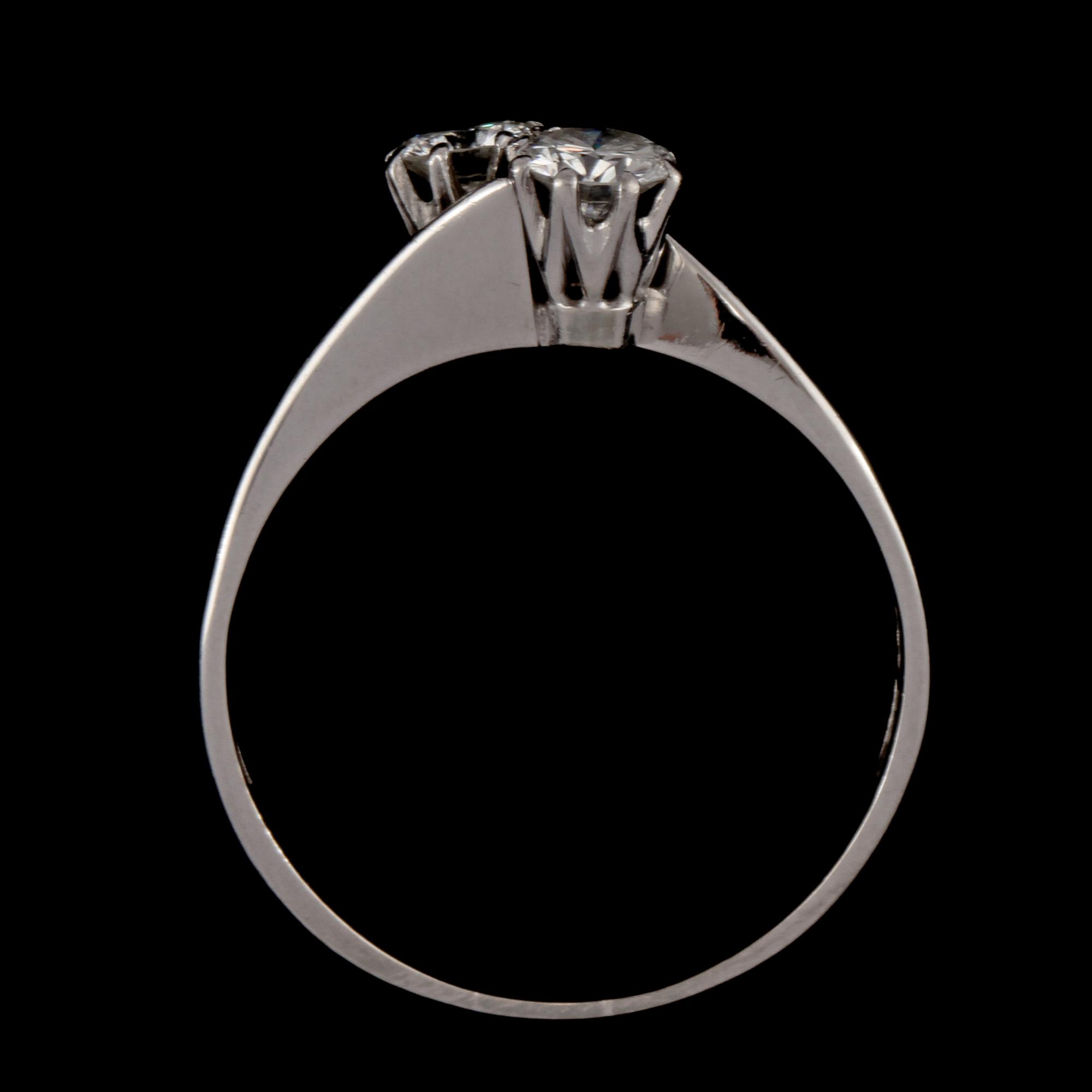 RING, 18k vitguld med två briljantslipade totalt 0,47 ct, Andersson & Magnusson,Göteborg, 1962. Vikt 3 g.