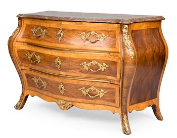 A ROCOCO CHEST OF DRAWERS.