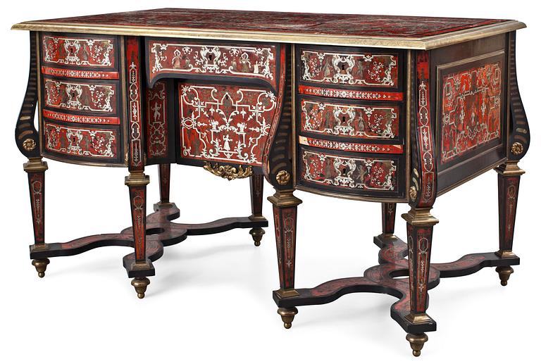 A 19th century Baroque-style free-standing writing table in the manner of Charles Boulle.