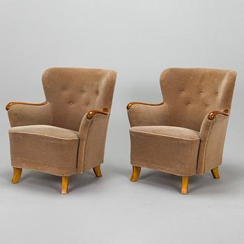 A pair of 1950's armchairs.