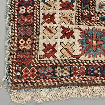 MATTO, an antique Kuba, ca 289,5 x 97 cm (as well as the ends with 1 cm light blue soumak).