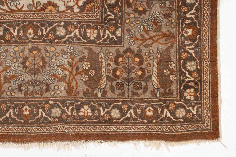 An antique Tabriz carpet, Northwest Persia, 453 x 310 cm.
