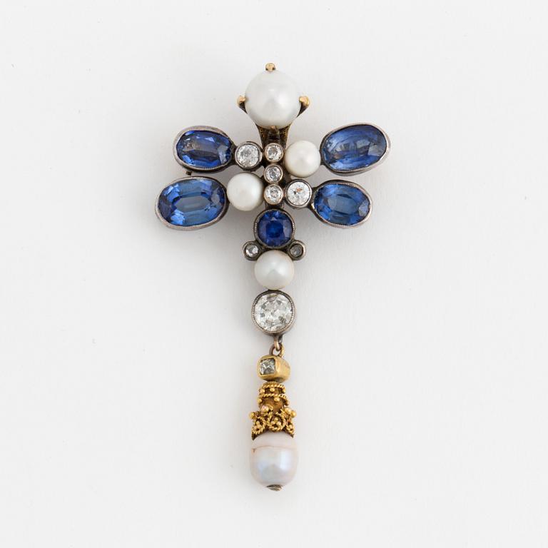 A brooch set with old-cut diamonds. fresh-water pearls and synthetic sapphires.