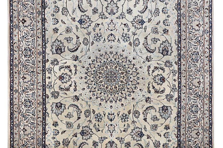 A carpet, Nain, part silk, 6 laa, c. 294 x 193 cm.