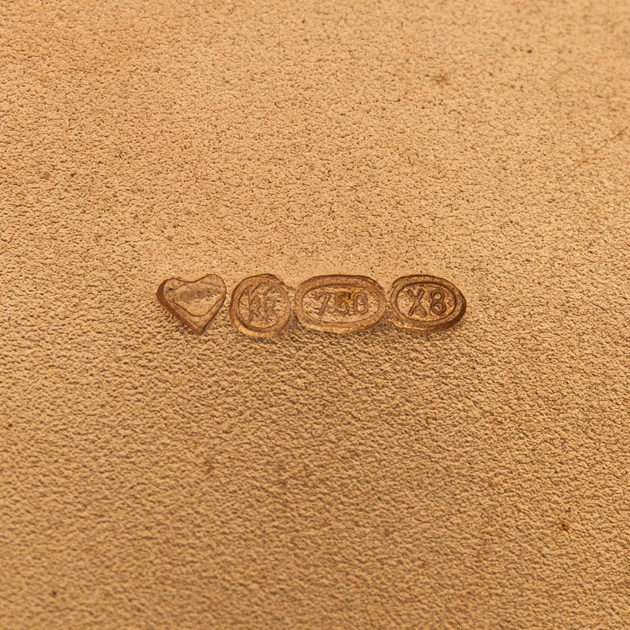 Rannekoru "Aurinkoleijona", 18K kultaa. Kalevala koru, Helsinki 1999.