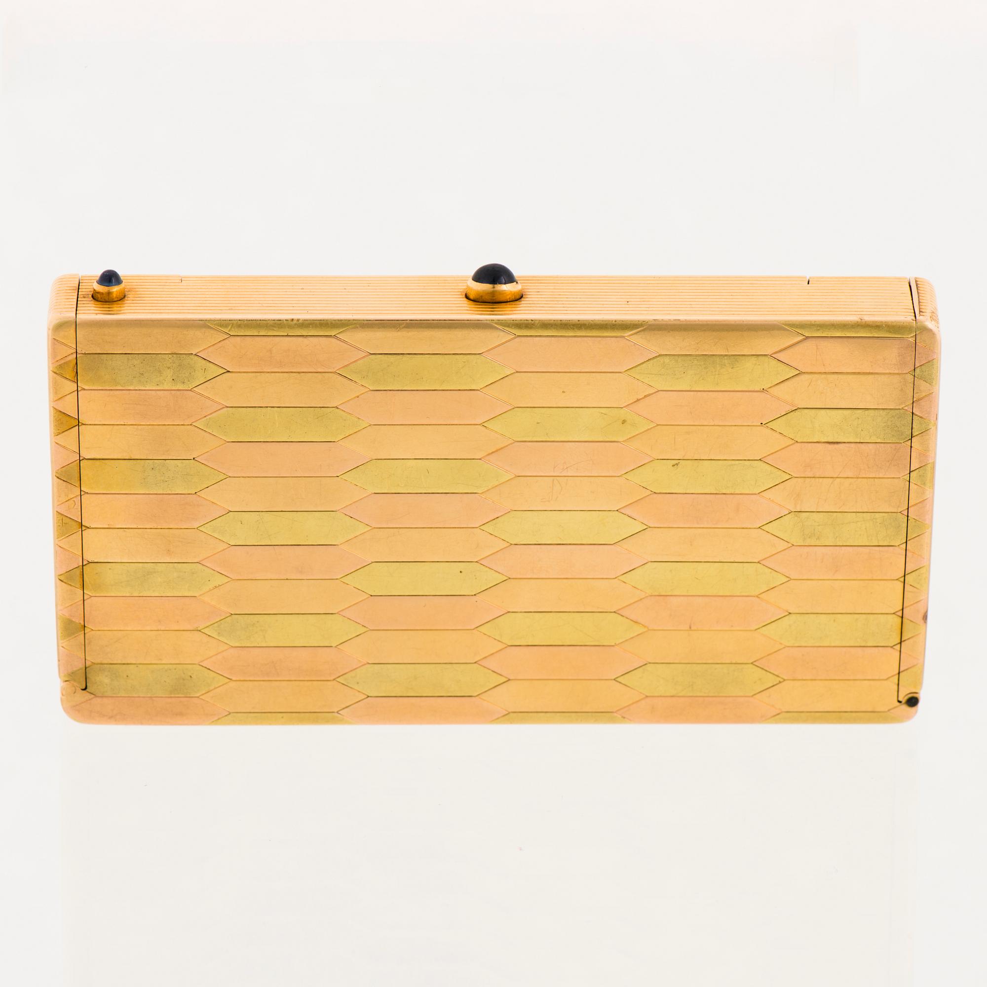 A CARTIER CASE, 18K gold in three colours, cabochon cut sapphires.