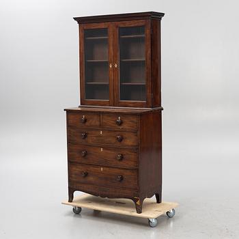 A 19th Century matced mahogany veneered cabinet.